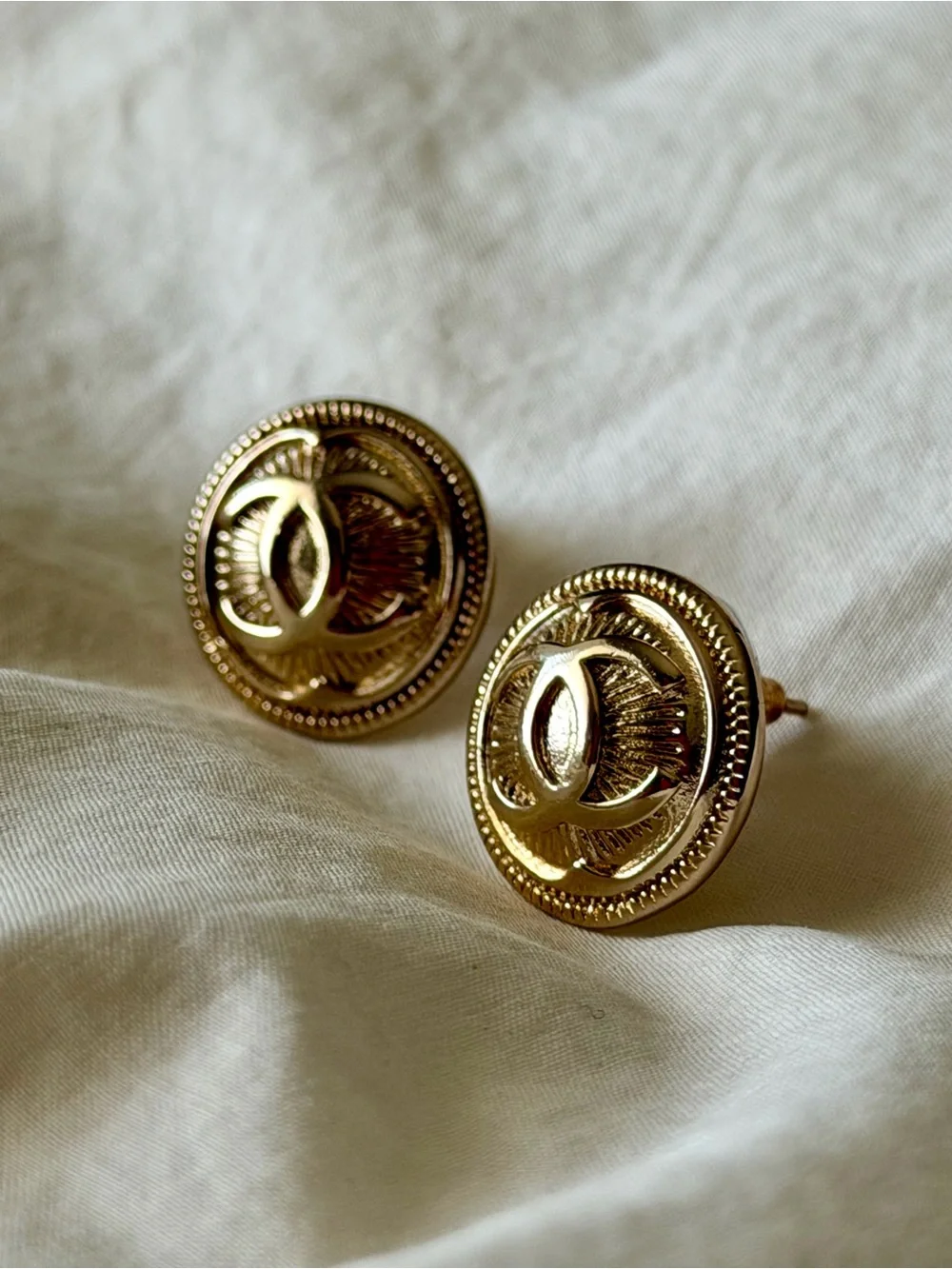 CHANEL Gold Round Interlocking CC Button Earrings
